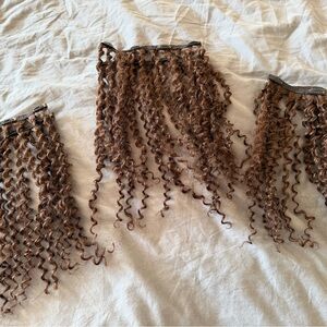 Voluminous Curly Hair Extensions in Rich Brown